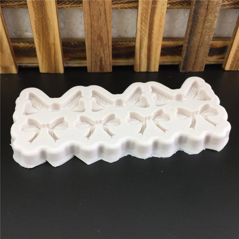 Smello's 7 Cavity Bows Silicone Fondant Mould (FB 108)