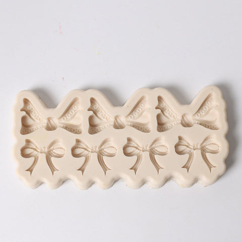 Smello's 7 Cavity Bows Silicone Fondant Mould (FB 108)