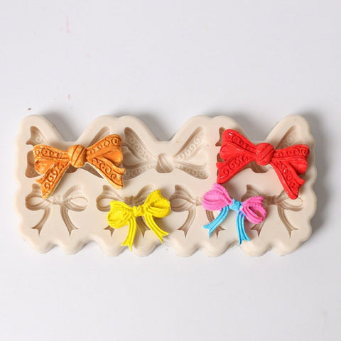 Smello's 7 Cavity Bows Silicone Fondant Mould (FB 108)